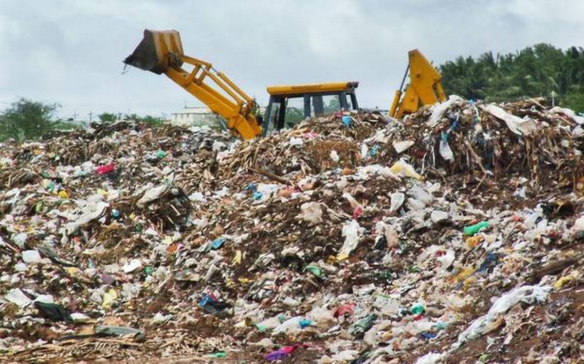 TNPCB crew collects soil samples from illegal garbage dumping in Coimbatore: